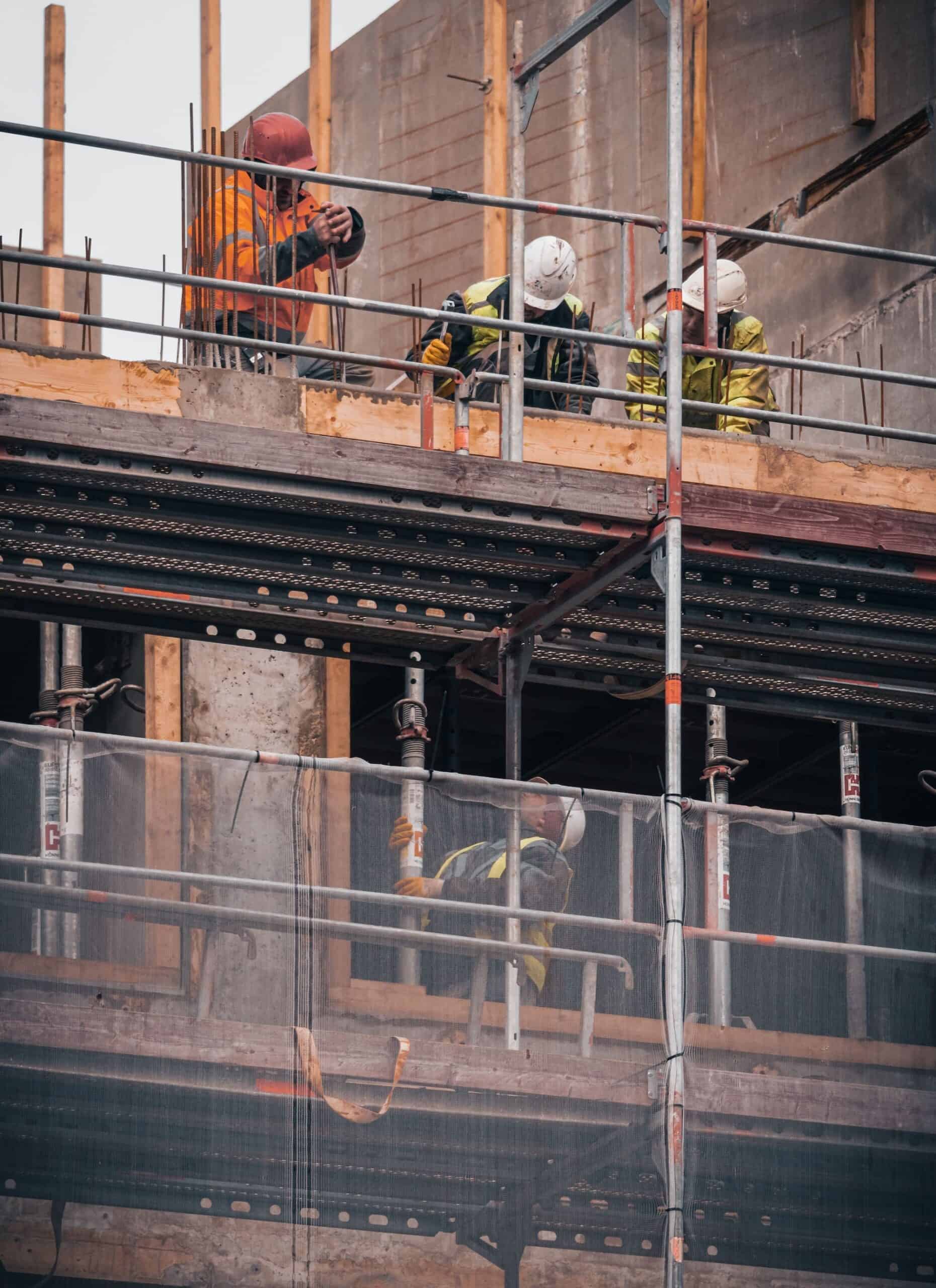 construction workers on scaffolding