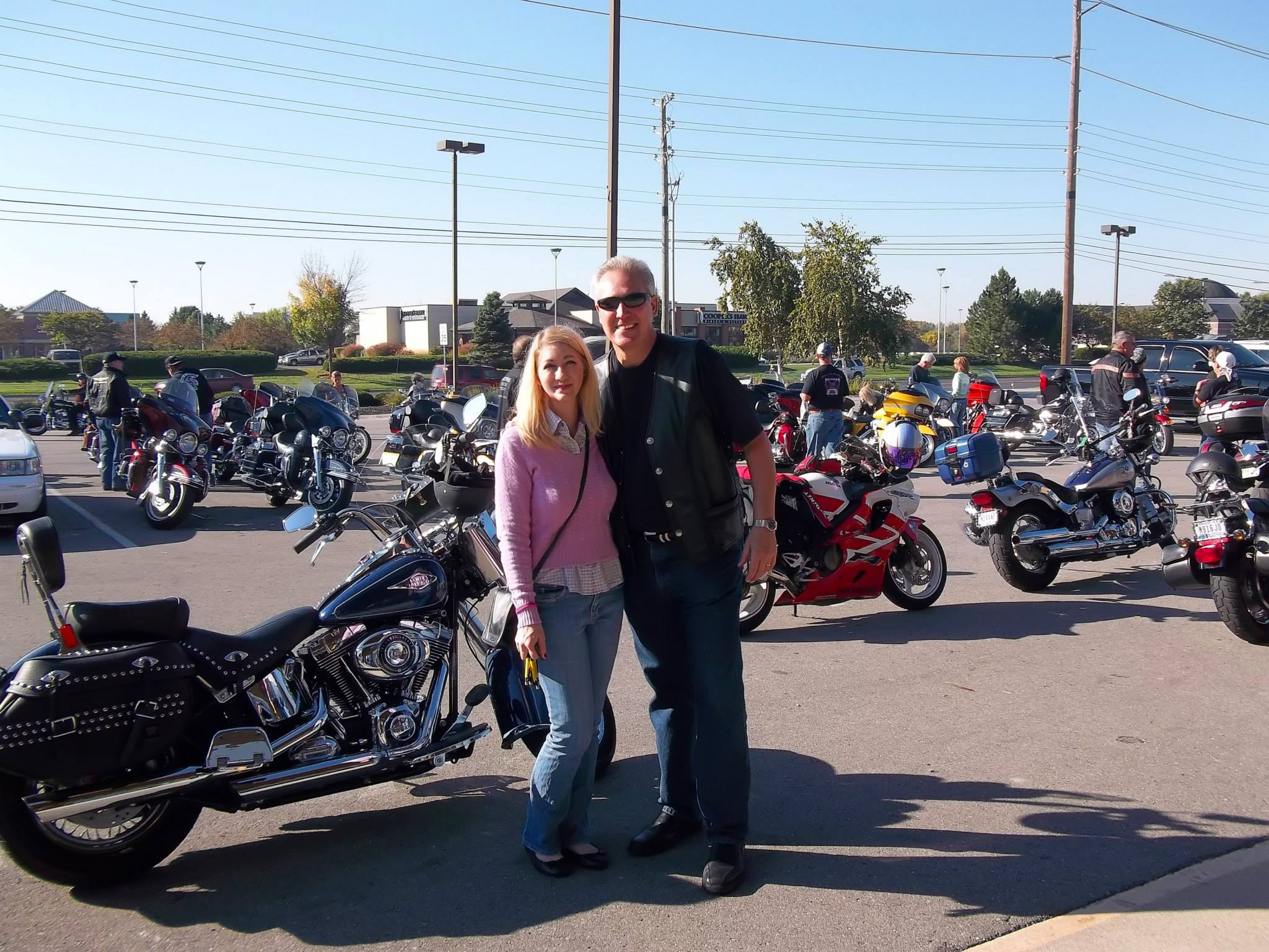 Amy Van Ostrand of Ladendorf Fregiato & Bigler and Mark Ladendorf at the "Rock for the Cure" ride to benefit breast cancer at Harley Davidson North in Indy. 