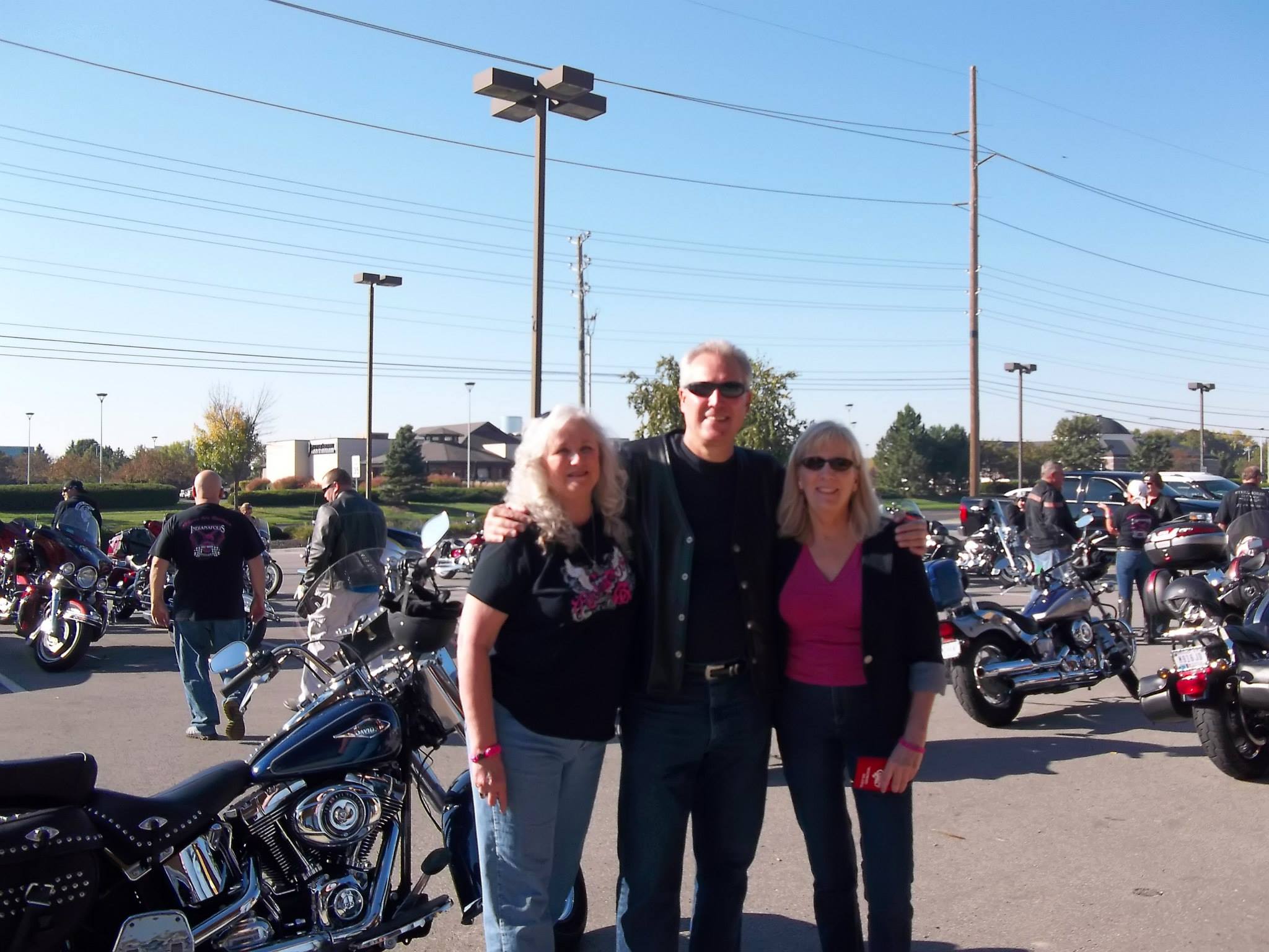 Paula of Rock for the Cure, Mark Ladendorf, and Julie Weiler at the "Rock for the Cure" ride to benefit breast cancer at Harley Davidson North in Indy